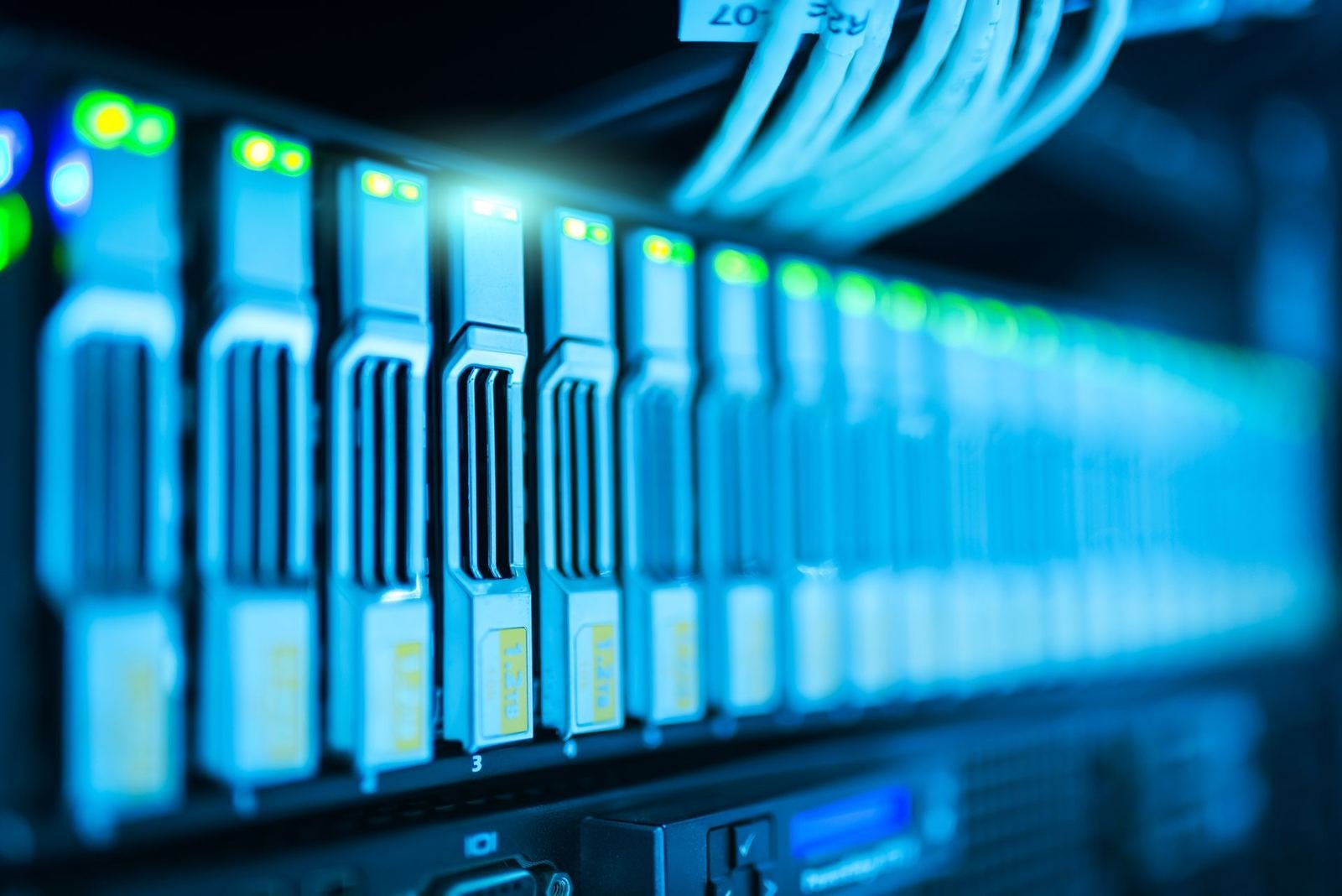 Rows of rack servers with drive bays and status lights