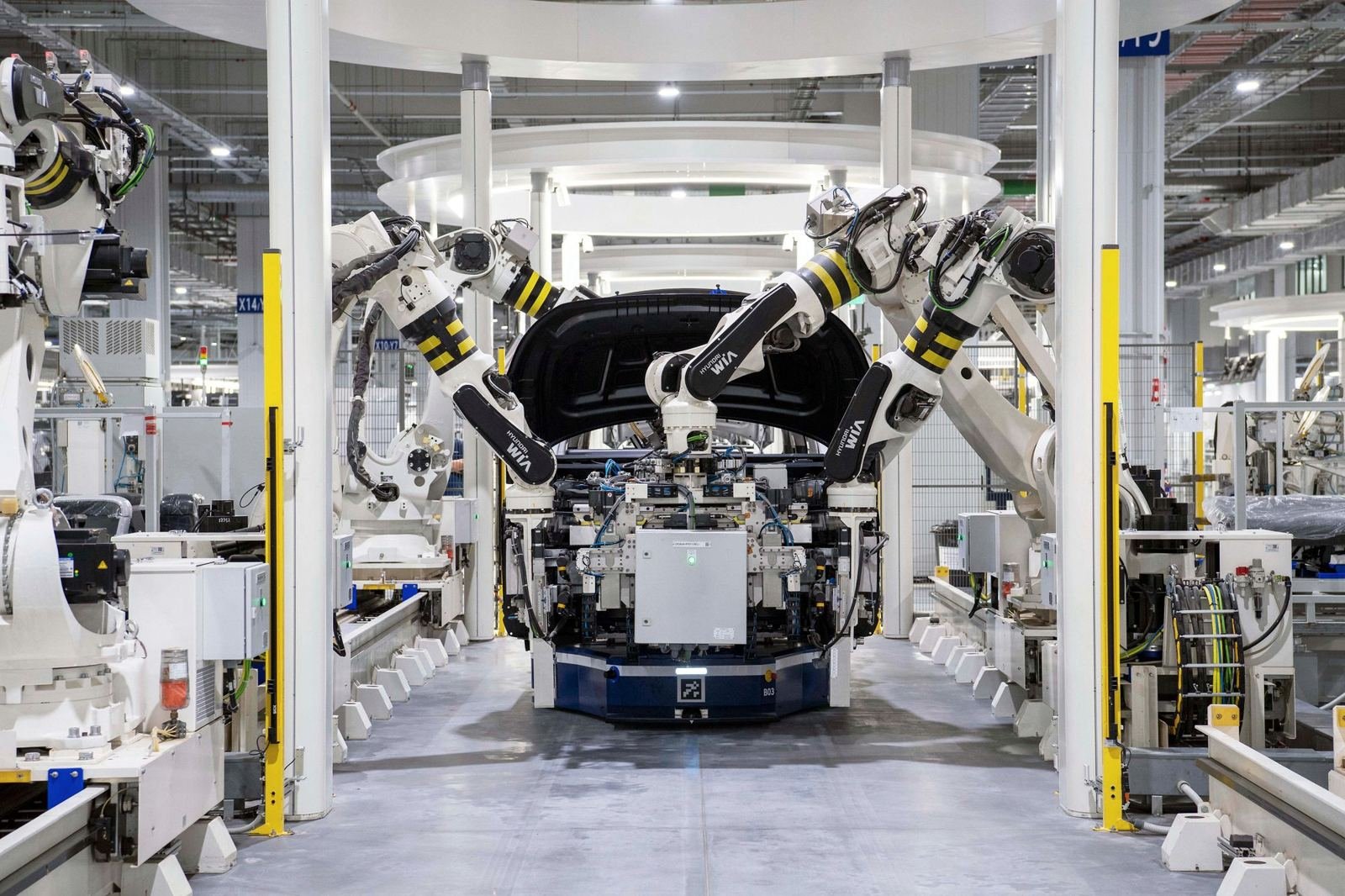 Robots assembling a car body