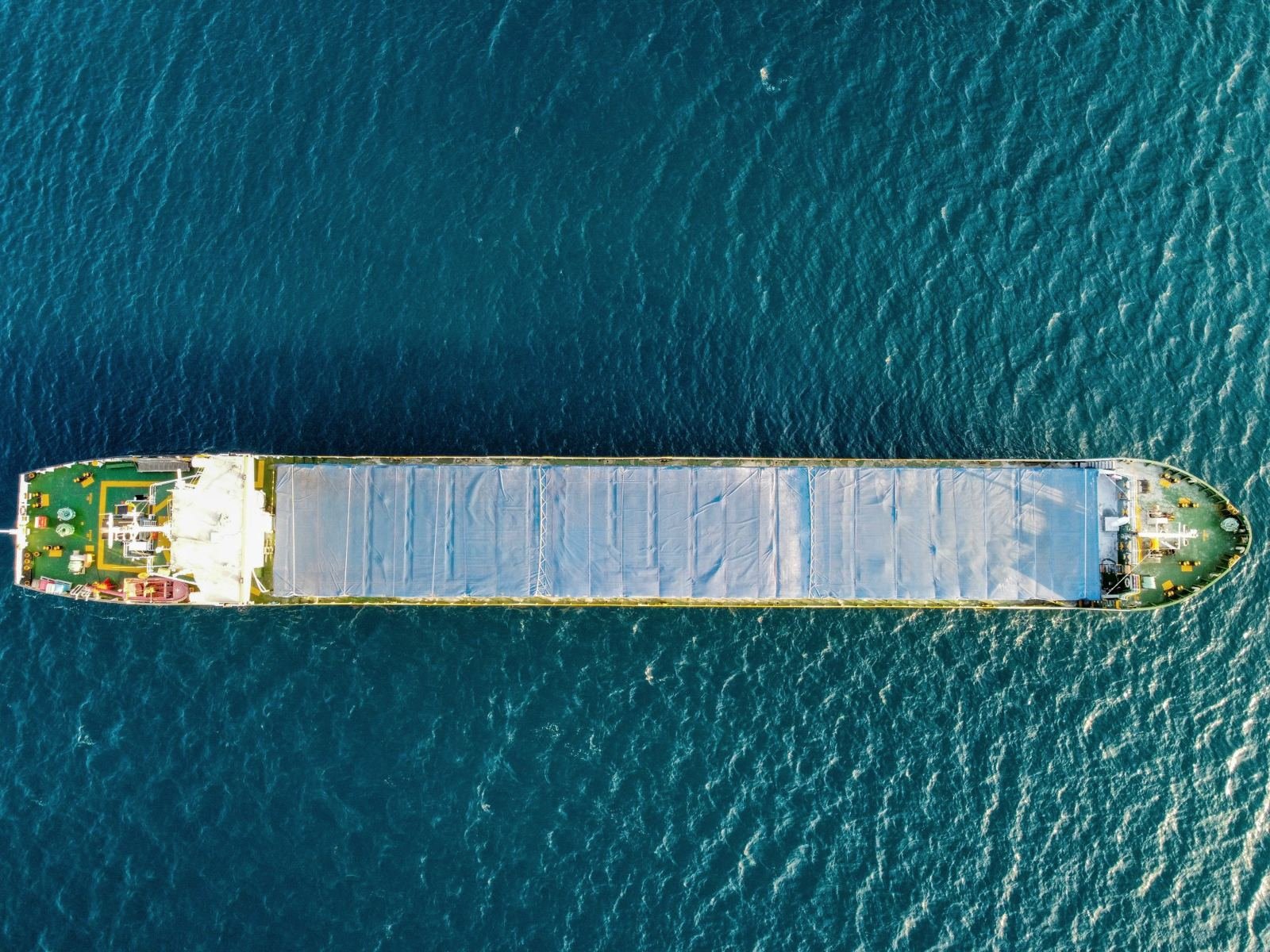 Cargo ship at sea seen from above